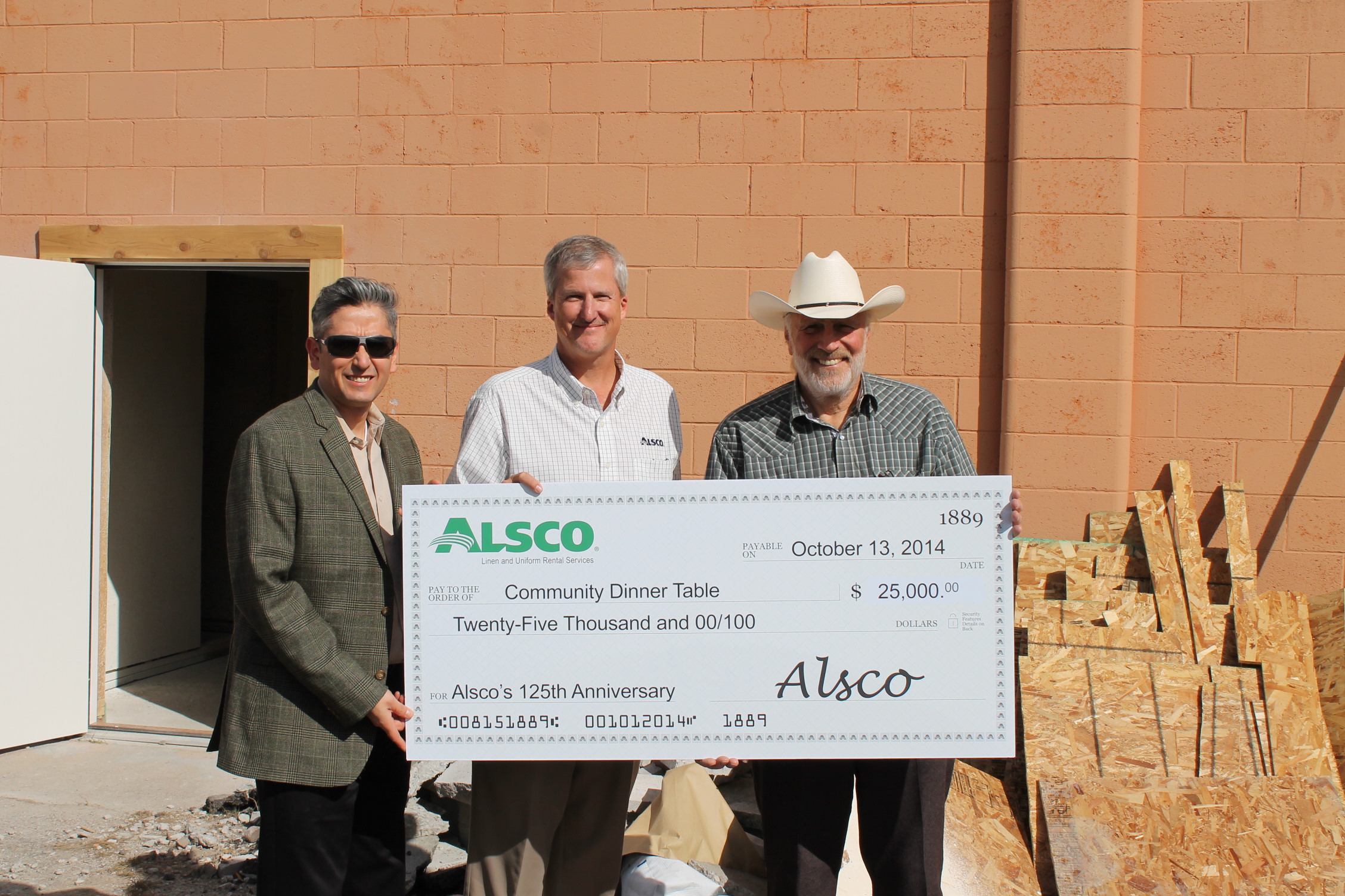 Alsco Presents Check for Food Pantry